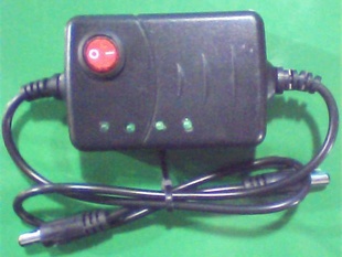 عű