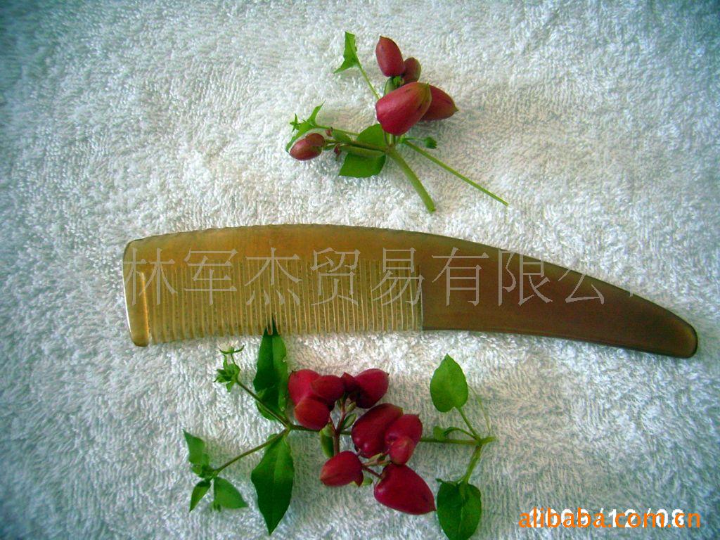 ţ