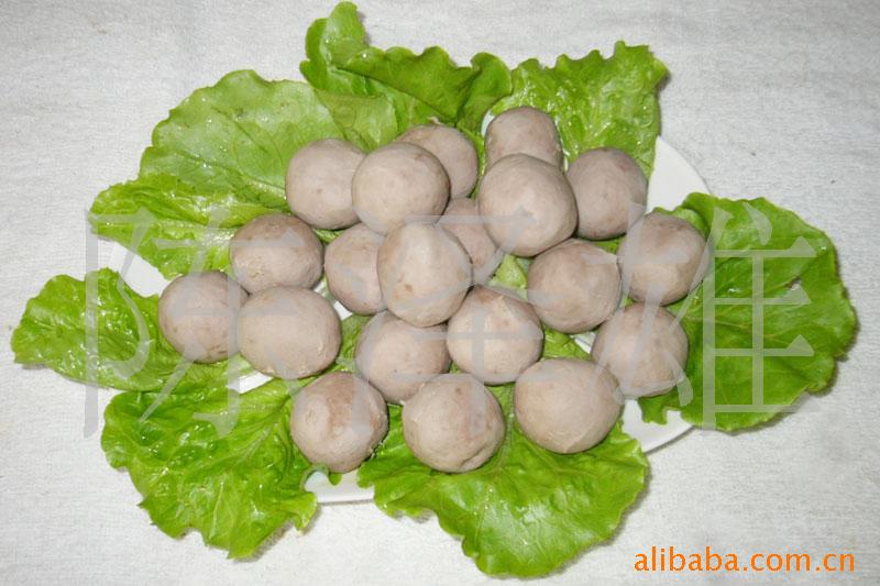ţ