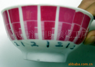 ޣ